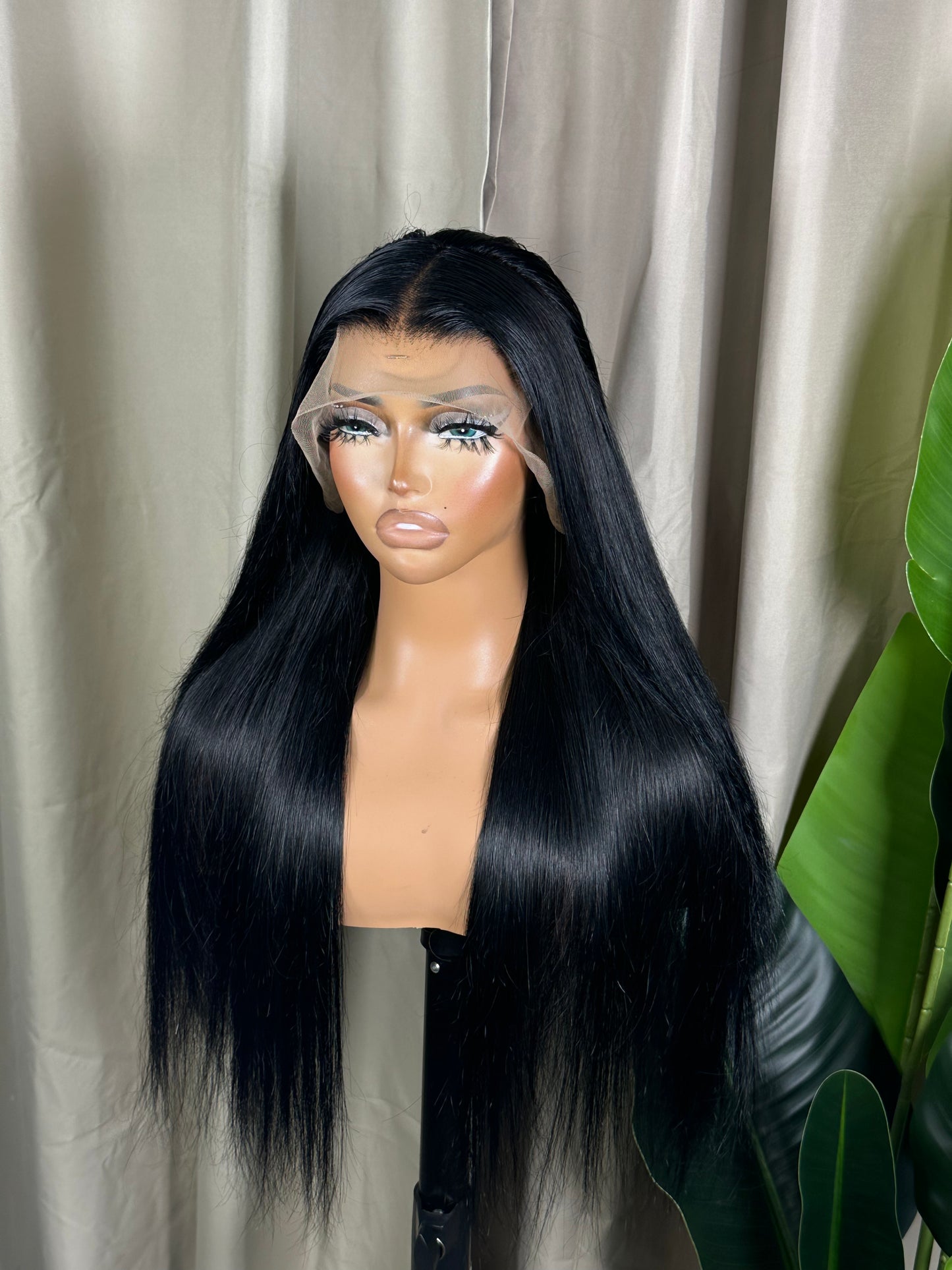 Sarah jet black human hair wig with sleek middle part